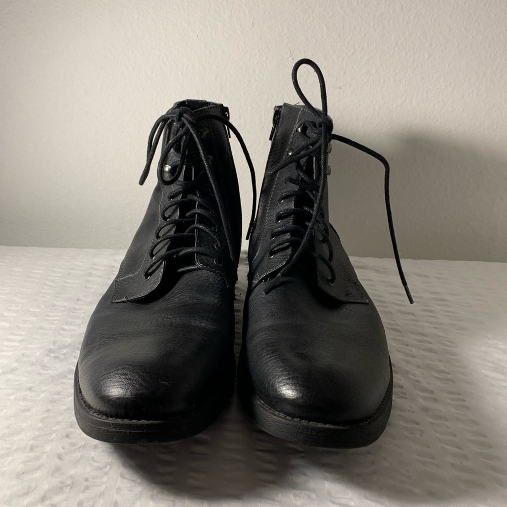 Pre-owned size 12 black boots.
